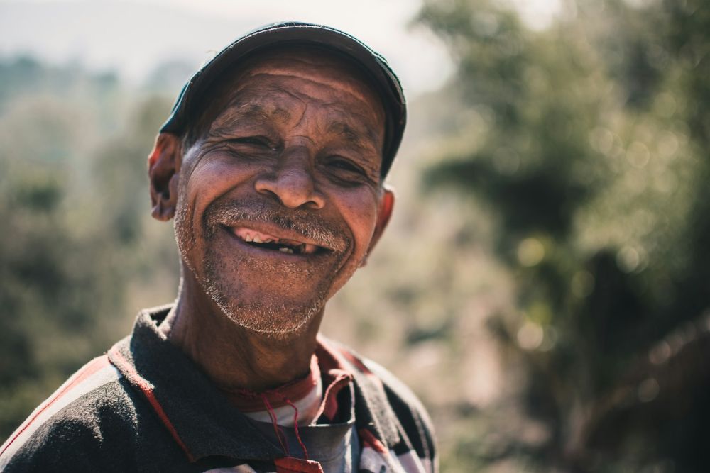 Smiling elderly man outdoors