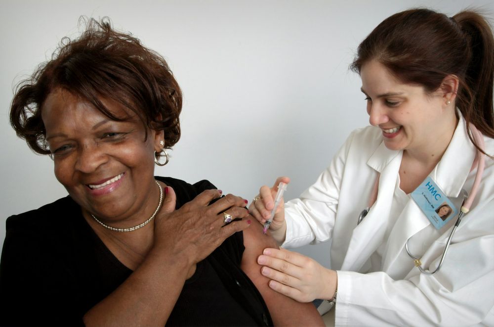 Smiling senior woman during a health check